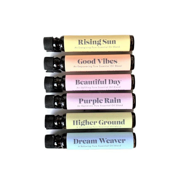 Six bottles of essential oil for diffuser jewellery, with colourful labels
