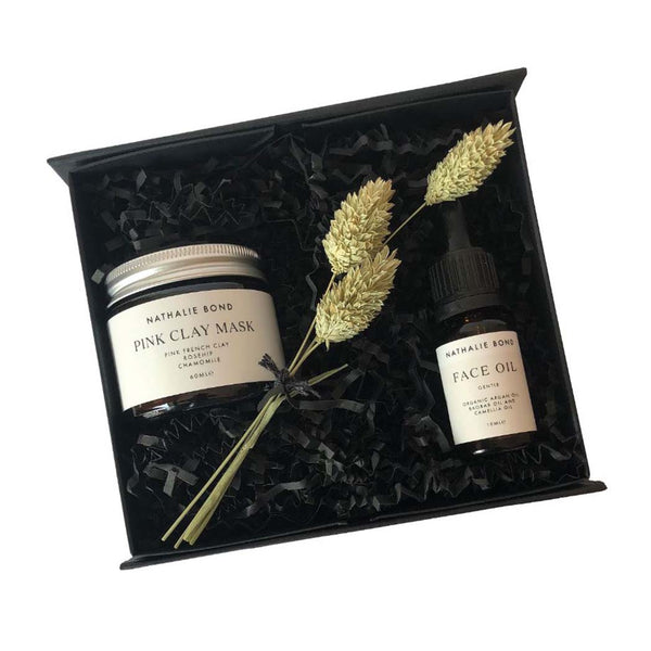 Clay mask and face oil in a gift box