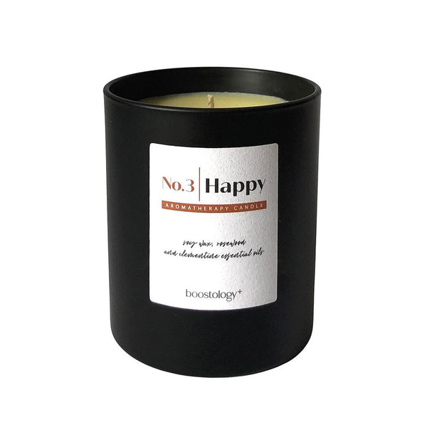 A black scented candle gift on a white background