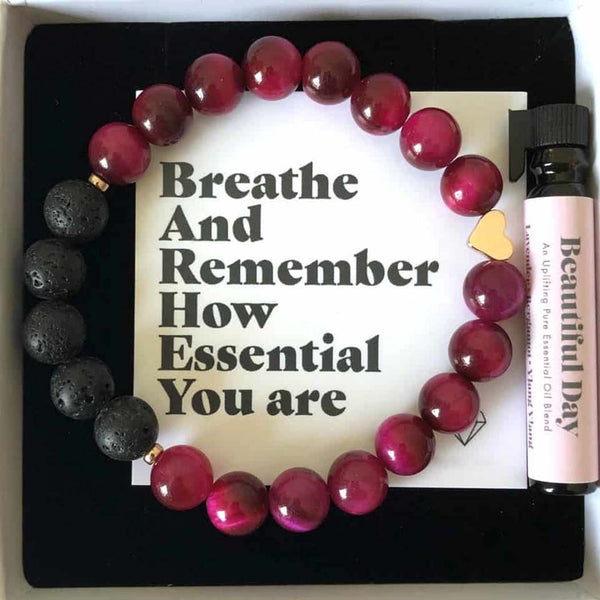 A white gift box containing the diffuser bracelet
