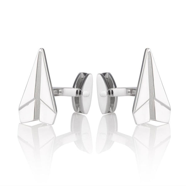 Two Silver paper plane cufflinks also on a white background