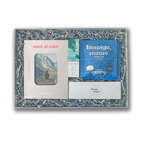 Hamper with 'deck of calm' cards, candles, essential oil and tea temples.