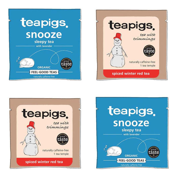 Four red and blue packets of tea, including a Christmas flavour called spiced winter red tea