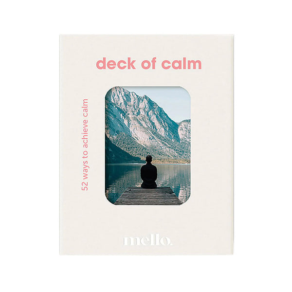 Deck of calm packaging showing a man sitting by a lake