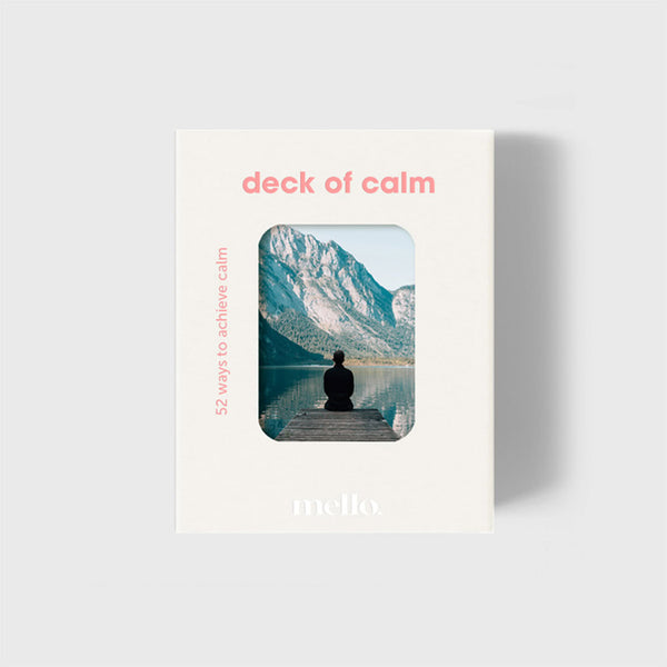 Deck of calm packaging showing a man sitting by a lake