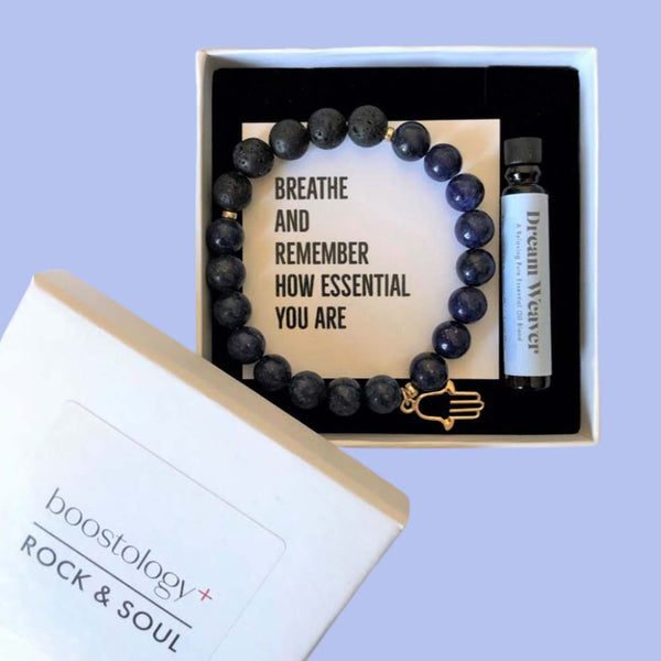 A diffuser bracelet in a white gift box
