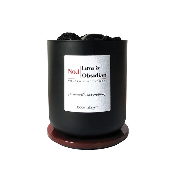 A black glass jar and white label with the words "Lava & Obsidian" 