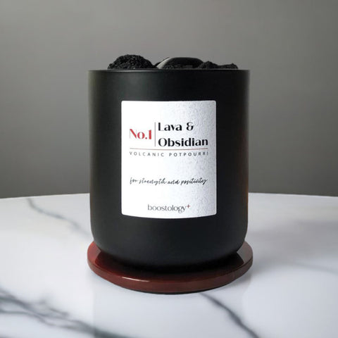A Volcanic Potpourri essential oil diffuser on a white marble table