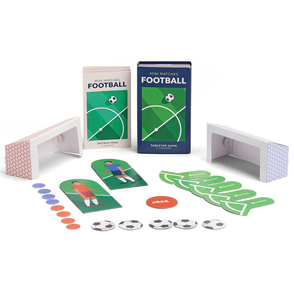 Football game pieces including goals, footballs, packaging and instructions on a white background