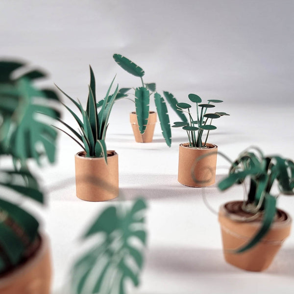 Set of paper plants on a neutral background