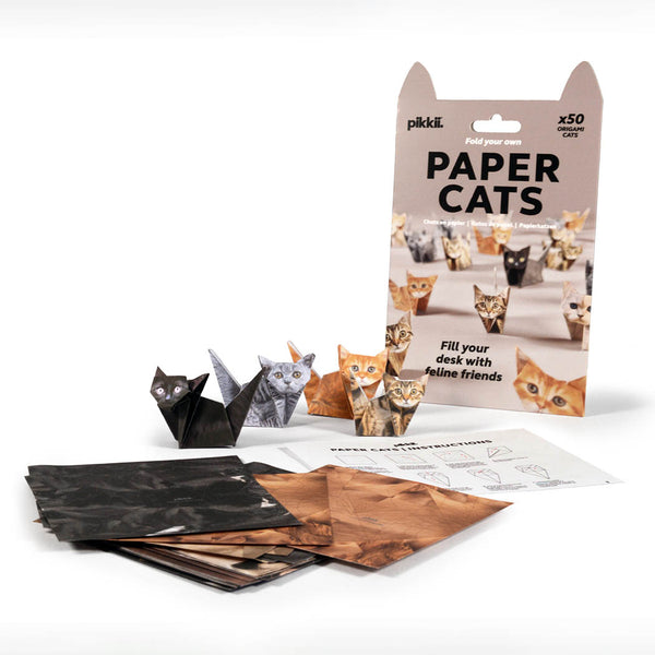 Packaging of 'Paper Cats' with finished origami cats, showing the contents inside the pack