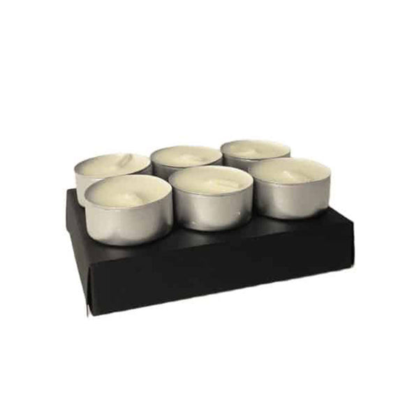 A black gift box with six tea light candles on top