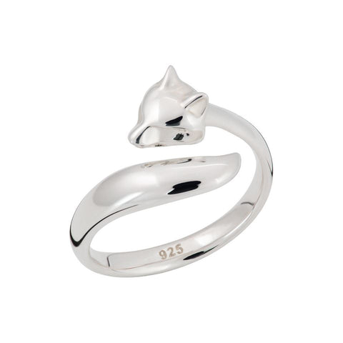 A silver fox ring on a white background