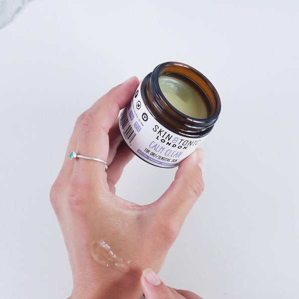 Woman rubbing calm clean on her hand