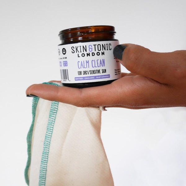 Woman holding a jar of calm clean