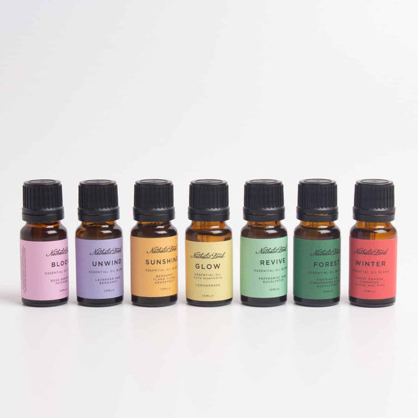 7 essential oil bottles with different coloured labels