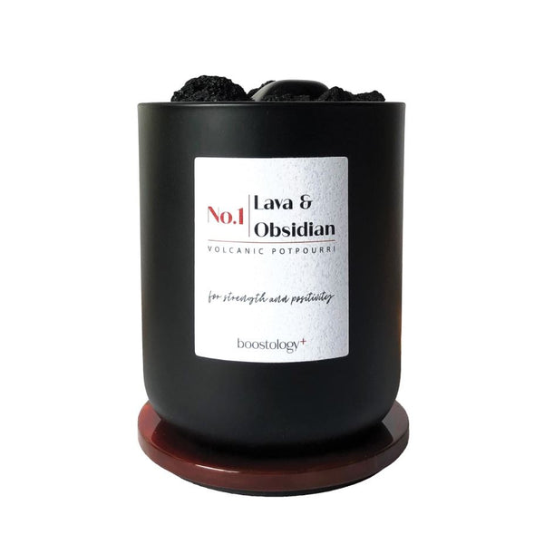 A volcanic potpourri essential oil diffuser with a white label
